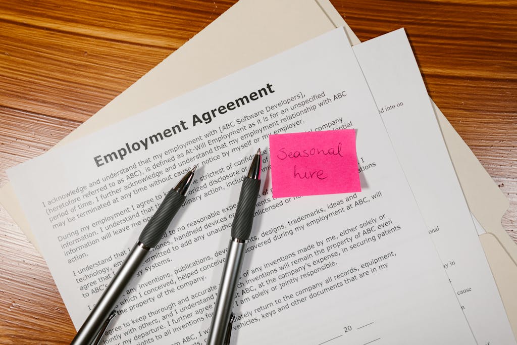 Top view of employment agreement contract